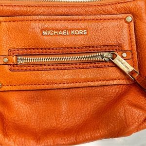 Michael Kors cross body bag. Loved, good condition. No damage outside/inside.